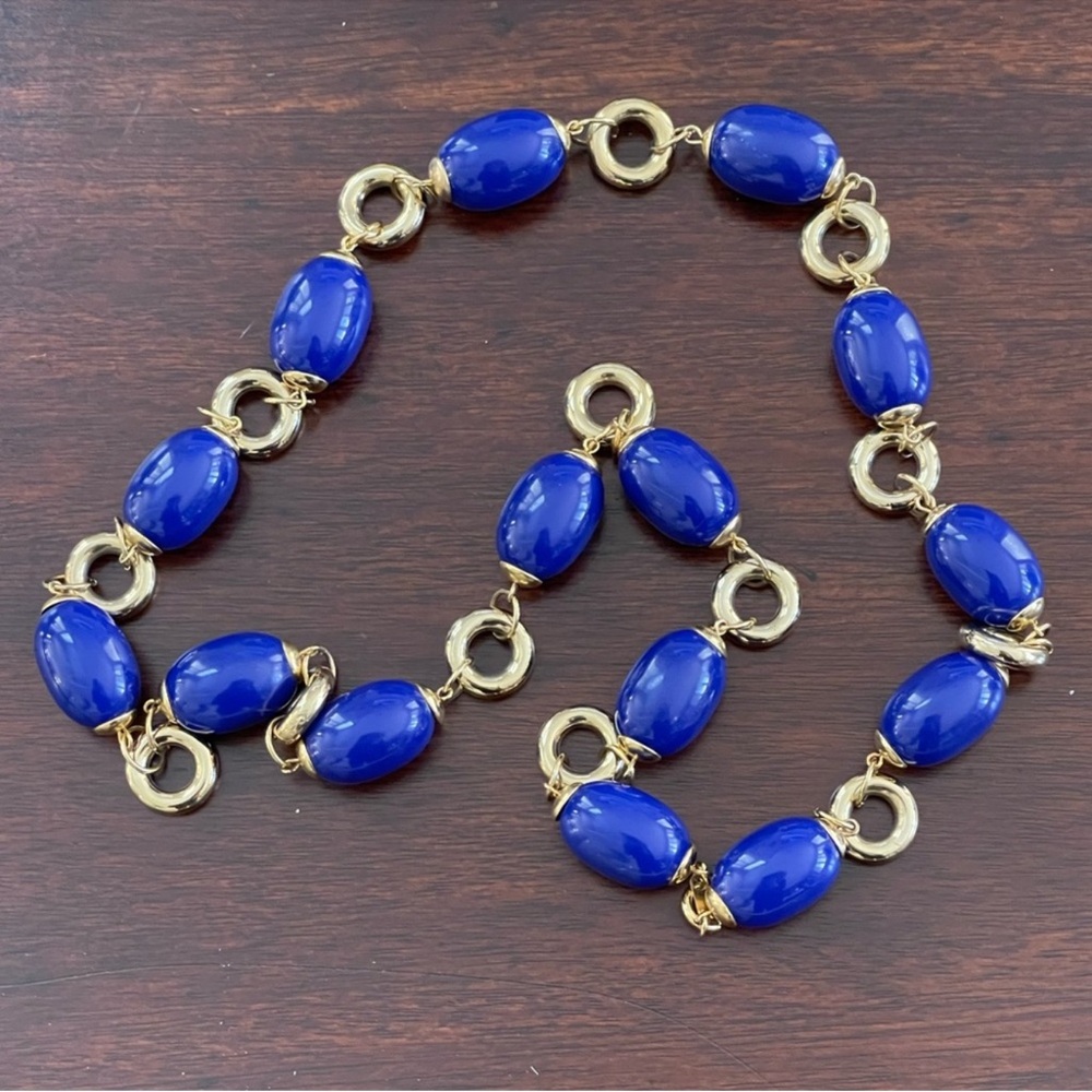 Lapis lazuli blue lucite gold tone metal necklace